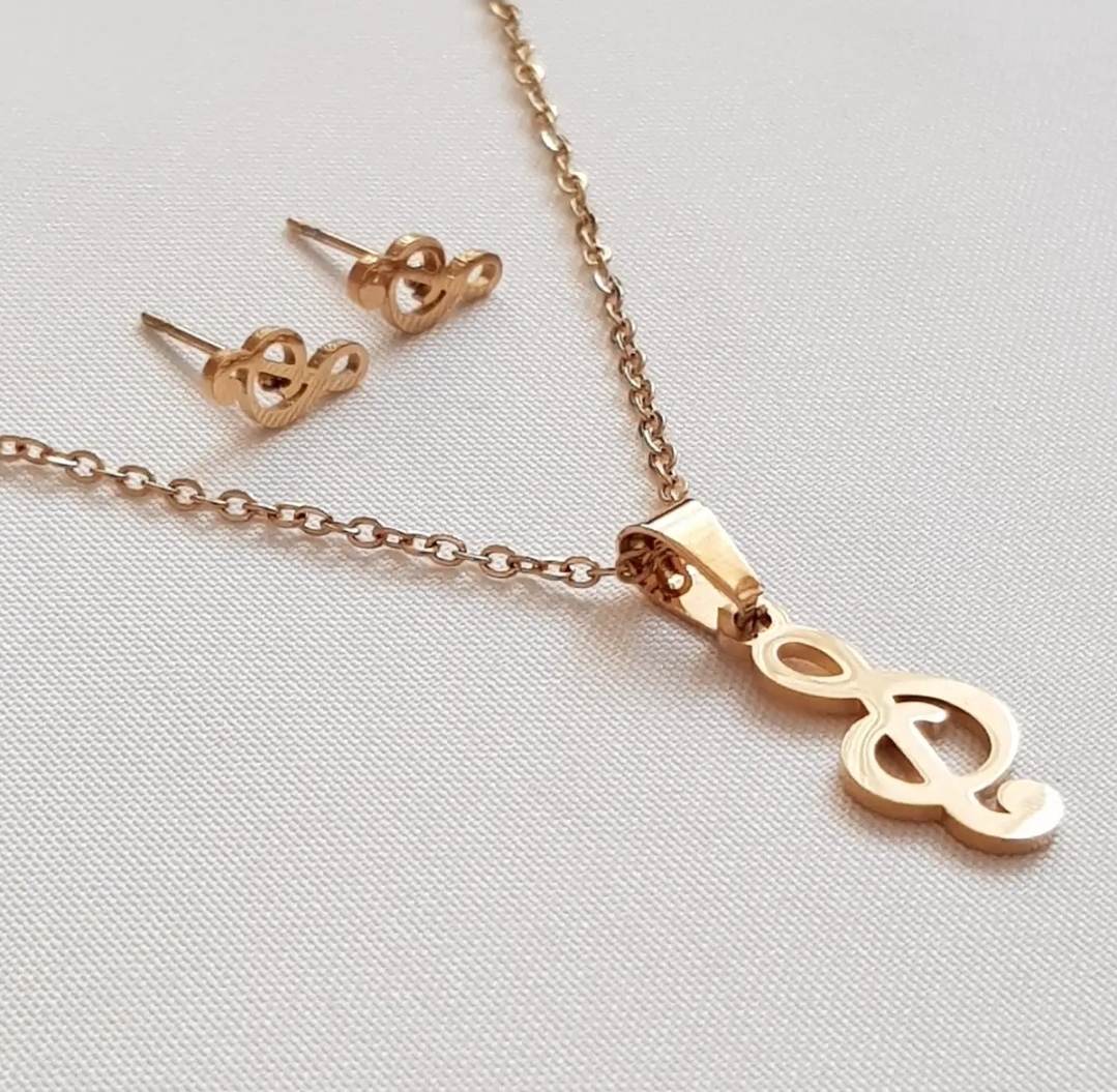 نیم ست (گردنبند و گوشواره) استیل طرح نت موسیقی